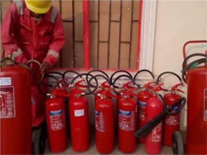 Matson technicians servicing extinguishers